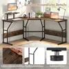 An L-shaped desk with a monitor stand and accessories, set up in a home office environment. Anteprima dell’immagine prodotto