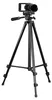 A black tripod with a camera mounted on top, isolated on a white background. Produktbild-Vorschau