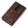 A brown flip cover for a smartphone is shown from a diagonal top-down perspective against a white background. Produktbild-Vorschau