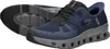 A pair of blue and gray Skechers athletic shoes are shown from a diagonal angle against a white background. Voir les images du produit