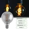 Three vintage-style LED light bulbs with spiral filaments, one in the foreground and two in the background. A panel with product specifications is on the right. Produktbild-Vorschau