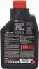 A black plastic bottle of motor oil with a red cap. Náhled obrázku produktu