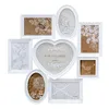 A collage of white photo frames arranged in a heart shape and other geometric shapes, displaying various decorative inserts. Produktbild-Vorschau