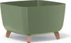 A green planter pot with wooden legs on a white background. Voir les images du produit