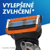 Close-up of a Gillette razor head with marketing text in the background. Podgląd zdjęcia produktu