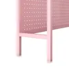 Close-up of the lower section of a pink metal desk shelf with a perforated side panel. Voir les images du produit