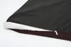 A close-up view of a dog mattress with a zipper partially open, revealing the white inner padding and a brown quilted base. Náhled obrázku produktu