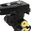 A close-up view of a black metal automotive component with yellow accents. Anteprima dell’immagine prodotto