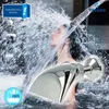 A woman showering with water spraying over her head, with a close-up of a showerhead in the foreground. Produktbild-Vorschau