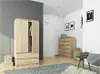 A bedroom or dressing room setting with a wardrobe, chest of drawers, and a chair. Produktbild-Vorschau