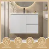 A white bathroom vanity with a sink and faucet, set against a wood-paneled wall and a circular mirror with integrated lighting. Four circular icons with text are displayed at the bottom. Produktbild-Vorschau