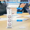 A retractable power strip with USB ports is shown on a table in a meeting room setting. Produktbild-Vorschau