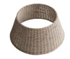 A beige woven Christmas tree skirt on a white background. Anteprima dell’immagine prodotto