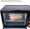 A toaster oven with sandwich bags inside. Produktbild-Vorschau