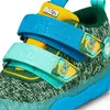 Close-up view of a child's shoe, focusing on the closure straps and upper material. Produktbild-Vorschau