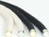 Close-up of two ropes, one white and one black, with metal caps on the ends. Produktbild-Vorschau