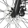A close-up view of a bicycle's front disc brake and wheel. Produktbild-Vorschau