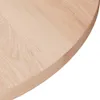 A close-up of the edge of a round, light-colored wooden tabletop, likely oak, against a white background. Náhled obrázku produktu