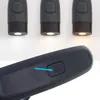 Three LED reading lights are shown from the front, with the bottom section emitting light. Below, a close-up shows a button on the side of a black device, with a blue arrow pointing to it. Anteprima dell’immagine prodotto