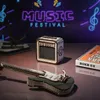 A wooden model of an electric guitar and amplifier are displayed in front of a neon "MUSIC FESTIVAL" sign. Voir les images du produit