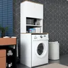 A laundry room with a washing machine, storage cabinets, and a vanity. Voir les images du produit