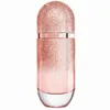 A glitter-covered perfume bottle with a rose gold gradient. Náhled obrázku produktu
