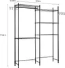 A black wire shelving unit with hanging hooks, designed to fit over a washing machine or dryer. Produktbild-Vorschau