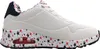 A single white sneaker with a red, white, and blue star pattern on the sole and interior lining. Voir les images du produit