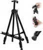 A black tripod easel is shown against a white background, with close-up inset images showing details of its construction and adjustment mechanisms. Podgląd zdjęcia produktu