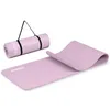 A rolled-up yoga mat with a carrying strap and an unrolled yoga mat on a white background. Anteprima dell’immagine prodotto