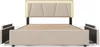 A beige upholstered bed frame with a padded headboard featuring integrated LED lighting and visible wooden slats for the mattress. Produktbild-Vorschau