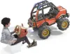 A young boy is playing with a Nintendo Labo Toy-Con 03: Vehicle Kit, using a cardboard steering wheel and pedal to control a virtual vehicle. Produktbild-Vorschau