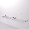 Two wall-mounted drying racks are shown on a white wall. Produktbild-Vorschau