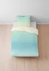 A duvet cover and pillow set laid out on a wooden floor against a white wall. Produktbild-Vorschau