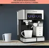 A coffee machine making espresso in a kitchen. Náhľad obrázku produktu