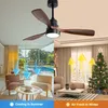 A split image showing a ceiling fan above a living room in summer and a living room decorated for Christmas in winter. Produktbild-Vorschau