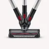 Close-up of the head and part of the handle of a cordless vacuum cleaner. Produktbild-Vorschau