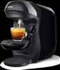 A black Tassimo coffee machine making coffee. Produktbild-Vorschau