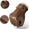 Close-up view of a brown leather glove with detailed stitching and a knitted cuff, with two inset detail views highlighting snap closures and stitching. Produktbild-Vorschau