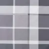 A close-up of a grey and white plaid cushion. Produktbild-Vorschau