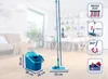 A cleaning set including a mop and bucket is displayed in a living room setting. Náhľad obrázku produktu