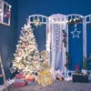 A festive Christmas scene with a flocked tree, gifts, and decorative elements. Produktbild-Vorschau