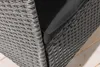 A close-up view of the corner of a gray rattan garden bench with a black cushion. Produktbild-Vorschau