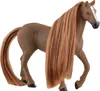 A brown toy horse with a long, flowing mane and tail stands on a white background. Voir les images du produit