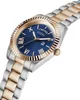 A close-up, angled shot of a men's watch with a blue dial and a two-tone metal band. Produktbild-Vorschau