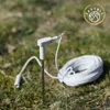 A close-up view of a soil moisture sensor with a coiled white cable on grassy ground, with a logo in the upper right corner. Produktbild-Vorschau