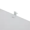 A close-up of a white plastic clip attached to a white surface. Voir les images du produit