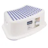 A white plastic step stool with purple dots on the top surface, shown against a white background. Produktbild-Vorschau
