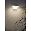 A white wall-mounted light fixture with a circular top and a rectangular base. Produktbild-Vorschau