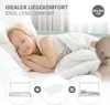 A young girl sleeping peacefully in a bed, with diagrams showing the bed components and assembly. Náhled obrázku produktu